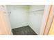 Walk-in closet featuring carpet and shelving, providing ample storage space at 7815 Shingle Beach St, Las Vegas, NV 89166