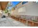 Fenced backyard features gray rock and a small planted flower bed at 7963 Cape Brett St, Las Vegas, NV 89131