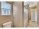 Bright bathroom featuring a white tiled shower-tub combo and neutral wall colors at 7963 Cape Brett St, Las Vegas, NV 89131