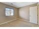 Bedroom with neutral carpet, bright natural light, and a standard closet at 7963 Cape Brett St, Las Vegas, NV 89131