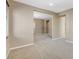 Spacious and cozy living area with neutral walls and carpet offers a warm and inviting space at 7963 Cape Brett St, Las Vegas, NV 89131