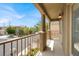 Balcony with decorative iron railing and exterior lighting at 8015 Maple Park St, Las Vegas, NV 89131