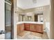 Bathroom boasting a double vanity, large mirror, and walk-in shower at 8015 Maple Park St, Las Vegas, NV 89131