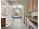 Hallway with an archway that leads to a sitting room and built in office space at 8015 Maple Park St, Las Vegas, NV 89131