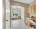 This home office has built in shelves and desk, an archway, and a sitting area at 8015 Maple Park St, Las Vegas, NV 89131