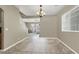 Open-concept featuring a stairway and an adjacent living room at 8015 Maple Park St, Las Vegas, NV 89131
