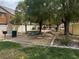 Community park with picnic table, grill, and plenty of shade trees at 8015 Maple Park St, Las Vegas, NV 89131