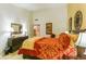 Warm bedroom featuring elegant furnishings, tasteful decor, and an ensuite bathroom for added privacy at 8777 Maule Ave # 3116, Las Vegas, NV 89148