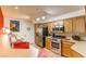 Functional kitchen offers stainless steel appliances, ample cabinetry, and efficient layout at 8777 Maule Ave # 3116, Las Vegas, NV 89148