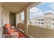 Comfortable covered patio with outdoor seating and views of the complex buildings at 8777 Maule Ave # 3116, Las Vegas, NV 89148