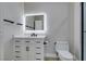 Updated bathroom features a stylish vanity with an illuminated mirror and modern fixtures at 9050 W Warm Springs Rd # 1117, Las Vegas, NV 89148