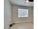 Bedroom featuring a window with blinds and tiled floors at 9050 W Warm Springs Rd # 1117, Las Vegas, NV 89148