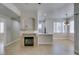 Open-concept living space featuring a fireplace and tile flooring throughout at 9050 W Warm Springs Rd # 1117, Las Vegas, NV 89148