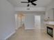 Spacious living room area featuring a fireplace, tile floors, and open layout at 9050 W Warm Springs Rd # 1117, Las Vegas, NV 89148