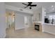 Cozy living room with a fireplace, tile floors, and an open floor plan at 9050 W Warm Springs Rd # 1117, Las Vegas, NV 89148