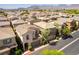 Birds eye view of a home in a residential area, showcasing its tile roof and landscaping at 10229 Mayflower Bay Ave, Las Vegas, NV 89166