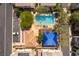 A community pool and lounge area with plenty of room to relax and enjoy the outdoors at 10229 Mayflower Bay Ave, Las Vegas, NV 89166