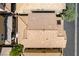 Aerial view of a home with a well-maintained roof, landscaping, and patio area at 10229 Mayflower Bay Ave, Las Vegas, NV 89166