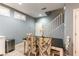Cozy dining area with stylish chairs and stairway access at 10229 Mayflower Bay Ave, Las Vegas, NV 89166