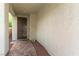 Covered entryway with brick pavers leading to the front door at 10229 Mayflower Bay Ave, Las Vegas, NV 89166