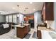 Open concept kitchen with island, perfect for entertaining and everyday living at 10229 Mayflower Bay Ave, Las Vegas, NV 89166
