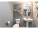 Quaint powder room with decorative shelving and stylish sink at 10229 Mayflower Bay Ave, Las Vegas, NV 89166