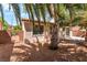 Private backyard featuring desert landscaping, a block wall, and covered patio at 10505 Jeremy Ridge Ave, Las Vegas, NV 89144