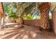 Backyard with palm trees and stone groundcover at 10505 Jeremy Ridge Ave, Las Vegas, NV 89144