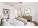 Bedroom with closet, neutral decor, and wood flooring at 10505 Jeremy Ridge Ave, Las Vegas, NV 89144