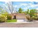 Charming single-story home featuring a well-maintained front yard and two-car garage at 10505 Jeremy Ridge Ave, Las Vegas, NV 89144