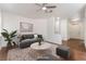 Stylish living room with neutral tones, modern furniture, and lots of light at 10505 Jeremy Ridge Ave, Las Vegas, NV 89144