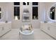 Luxurious bathroom showcasing a standalone tub, double vanity and modern finishes at 10781 Agate Cliffs Ave, Las Vegas, NV 89135