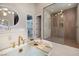 Spa-like bathroom featuring a soaking tub, glass shower, and stylish fixtures at 10781 Agate Cliffs Ave, Las Vegas, NV 89135