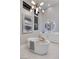 Chic bathroom featuring a soaking tub, modern lighting, and elegant decor at 10781 Agate Cliffs Ave, Las Vegas, NV 89135