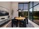 Dining room with large glass windows at 10781 Agate Cliffs Ave, Las Vegas, NV 89135