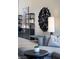 Stylish decor and modern furniture in open-concept living space with view of the exterior at 10781 Agate Cliffs Ave, Las Vegas, NV 89135