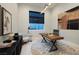 Office features a wood desk and modern decor at 10781 Agate Cliffs Ave, Las Vegas, NV 89135