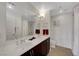 This well-lit bathroom features double sinks, stylish fixtures and a large mirror at 150 Las Vegas Blvd # 1503, Las Vegas, NV 89101