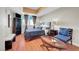 This spacious bedroom features sleek hardwood floors and a comfortable seating area at 150 Las Vegas Blvd # 1503, Las Vegas, NV 89101