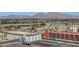 Urban view featuring buildings and parking areas, set against a scenic mountain range at 150 Las Vegas Blvd # 1503, Las Vegas, NV 89101