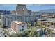 Bright city view of buildings, hotels, and cityscape with blue sky and scenic mountain range in the background at 150 Las Vegas Blvd # 1503, Las Vegas, NV 89101
