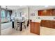 Bright dining area and kitchen featuring tile floors and a modern design with views of the living room and outside at 150 Las Vegas Blvd # 1503, Las Vegas, NV 89101
