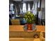 Close-up of a kitchen counter showcasing a potted plant and offering a glimpse into the dining area at 150 Las Vegas Blvd # 1503, Las Vegas, NV 89101