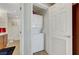 Conveniently located stackable washer and dryer in a utility closet near the bathroom at 150 Las Vegas Blvd # 1503, Las Vegas, NV 89101