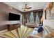 Stylish living room with a large television, comfortable seating, and a vibrant, patterned rug at 150 Las Vegas Blvd # 1503, Las Vegas, NV 89101