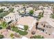 Aesthetic aerial view of a single-Gathering home featuring a backyard with manicured lawn and landscaping at 1515 Horizon Crest Ct, Henderson, NV 89012