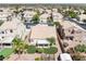 This beautiful single-Gathering home features a manicured backyard with patio and a desert landscape at 1515 Horizon Crest Ct, Henderson, NV 89012