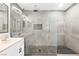 Modern bathroom with dual sinks and luxurious glass-enclosed shower at 1515 Horizon Crest Ct, Henderson, NV 89012