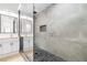 Contemporary bathroom featuring dual sinks and an expansive glass-enclosed shower at 1515 Horizon Crest Ct, Henderson, NV 89012