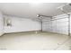 Spacious garage with a clean, epoxy-coated floor and ample room for storage at 1515 Horizon Crest Ct, Henderson, NV 89012